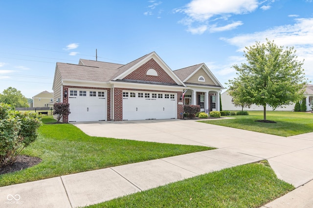 13327 Hockley Dr, Fishers, IN 46037 - view of front of house with an attached garage, brick siding, a front lawn, and driveway