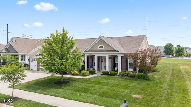 13327 Hockley Dr, Fishers, IN 46037 - view of front facade featuring a front yard, brick siding, concrete driveway, roof with shingles, and a garage