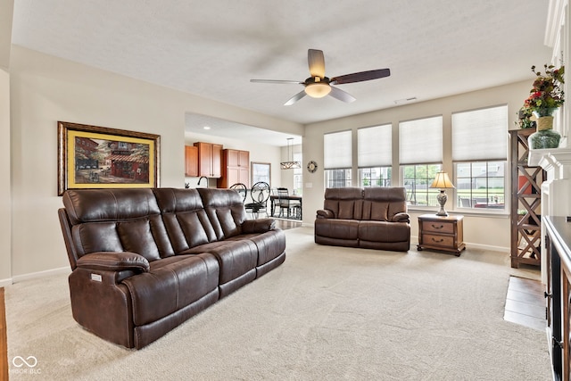 13327 Hockley Dr, Fishers, IN 46037 - living area with light colored carpet and a ceiling fan