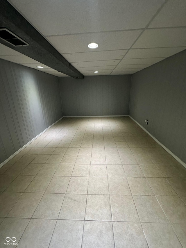 4908 Elmhurst Dr, Indianapolis, IN 46226 - spare room with a paneled ceiling, recessed lighting, and light tile patterned floors