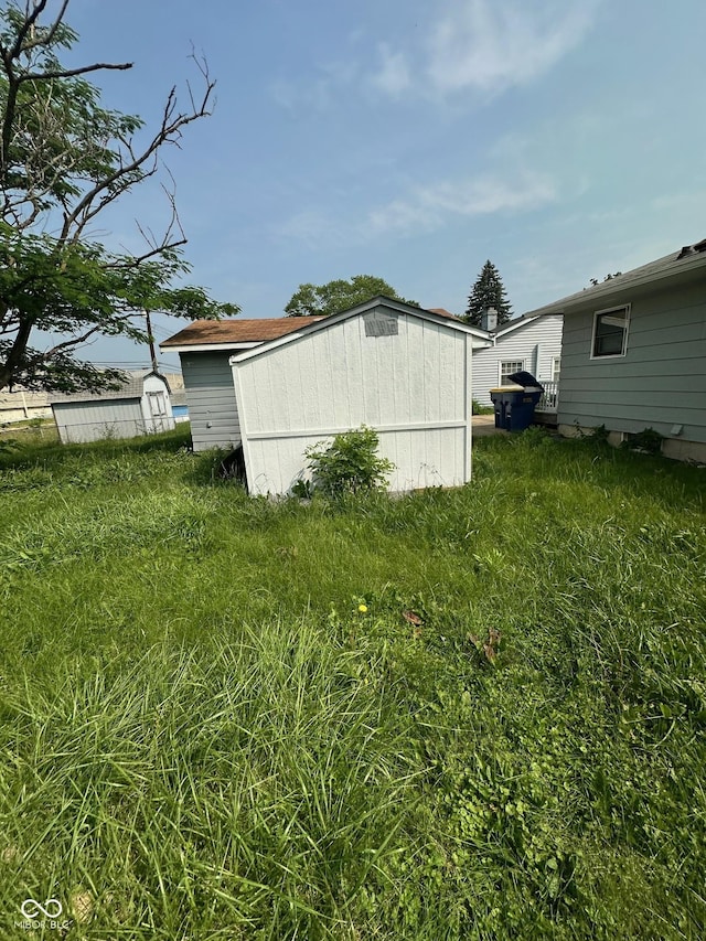 4908 Elmhurst Dr, Indianapolis, IN 46226 - view of yard with a storage shed