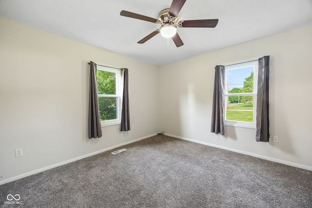 900 N College St N, Veedersburg, IN 47987 - carpeted empty room featuring baseboards and a ceiling fan