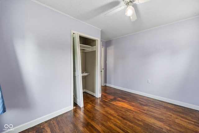 900 N College St N, Veedersburg, IN 47987 - unfurnished bedroom with wood finished floors, crown molding, a closet, and ceiling fan
