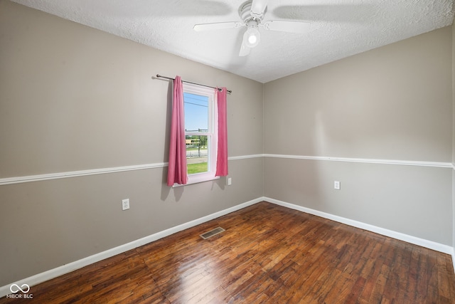 900 N College St N, Veedersburg, IN 47987 - empty room featuring hardwood / wood-style floors, a ceiling fan, and a textured ceiling