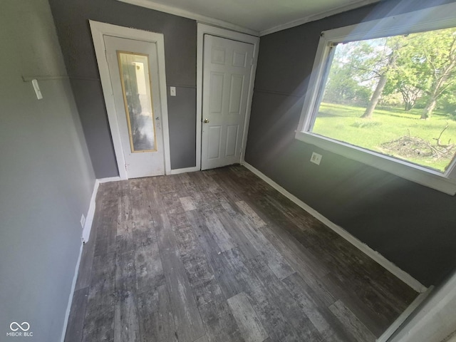 711 W Centennial Ave, Muncie, IN 47303 - empty room featuring wood finished floors and baseboards