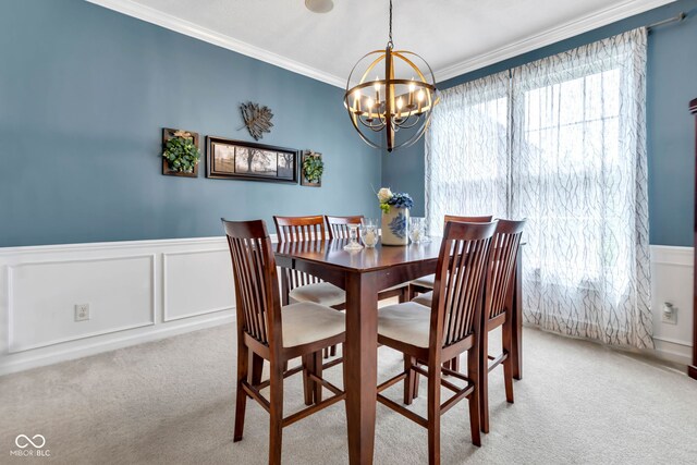 705 Ridge Gate Dr, Brownsburg, IN 46112 - dining room with carpet flooring, a chandelier, crown molding, a wainscoted wall, and a decorative wall