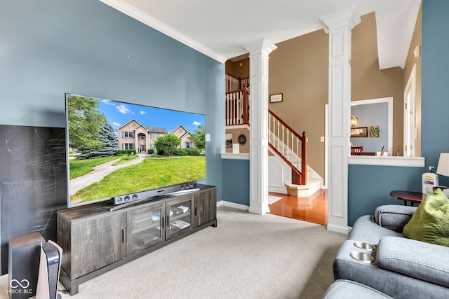 705 Ridge Gate Dr, Brownsburg, IN 46112 - carpeted living area with ornate columns, stairway, and ornamental molding