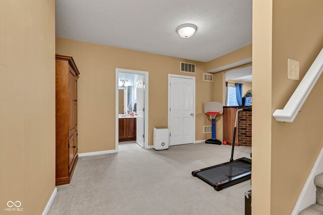 705 Ridge Gate Dr, Brownsburg, IN 46112 - workout area featuring light carpet
