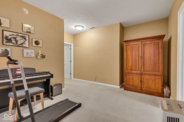 705 Ridge Gate Dr, Brownsburg, IN 46112 - workout room with carpet flooring and baseboards