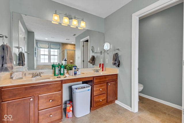 705 Ridge Gate Dr, Brownsburg, IN 46112 - full bathroom featuring double vanity, a shower stall, and tile patterned floors