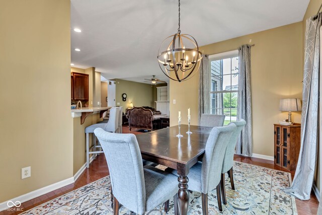 705 Ridge Gate Dr, Brownsburg, IN 46112 - dining space with a chandelier, ceiling fan, recessed lighting, and wood finished floors
