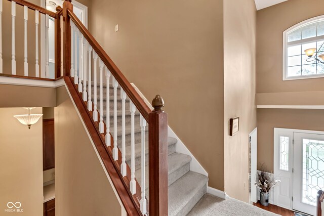 705 Ridge Gate Dr, Brownsburg, IN 46112 - foyer with stairs and a towering ceiling