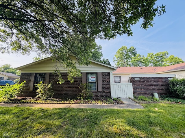 4408 Clovelly Ct, Indianapolis, IN 46254 - ranch-style home with brick siding