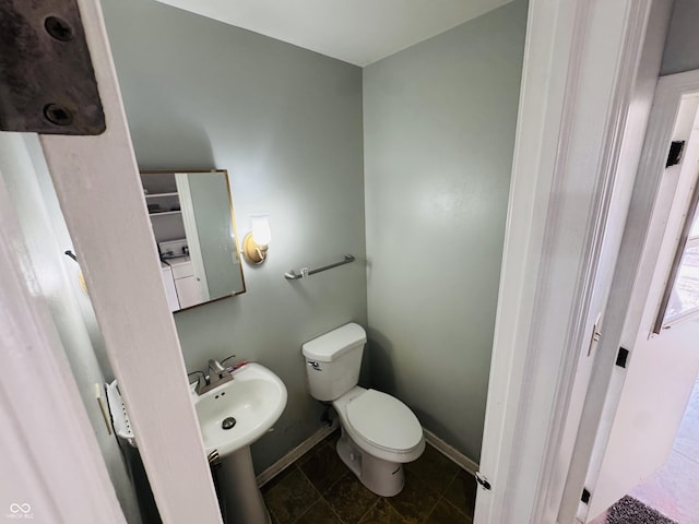 4408 Clovelly Ct, Indianapolis, IN 46254 - bathroom featuring toilet and tile patterned floors