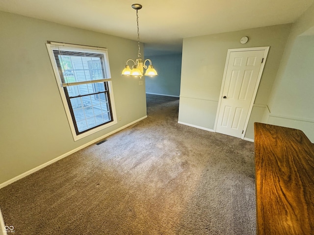 4408 Clovelly Ct, Indianapolis, IN 46254 - unfurnished dining area with a chandelier and carpet flooring