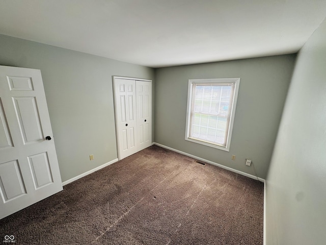 4408 Clovelly Ct, Indianapolis, IN 46254 - unfurnished bedroom featuring carpet and a closet