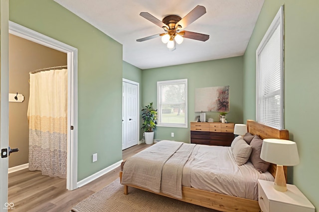 7928 Vontress St, Coatesville, IN 46121 - bedroom featuring wood finished floors, a closet, and ceiling fan