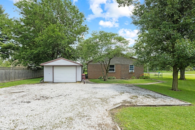 7928 Vontress St, Coatesville, IN 46121 - detached garage featuring gravel driveway