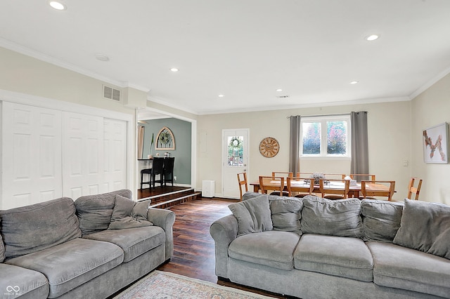 12606 Markay Dr, Fishers, IN 46038 - living room with dark wood-style floors, recessed lighting, ornamental molding, and decorative columns