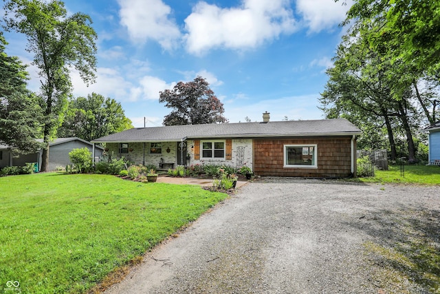 12606 Markay Dr, Fishers, IN 46038 - single story home featuring gravel driveway, a chimney, and a front lawn