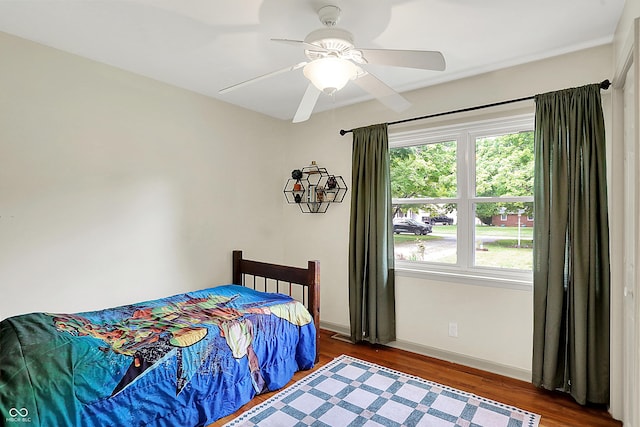 12606 Markay Dr, Fishers, IN 46038 - bedroom with wood finished floors and a ceiling fan