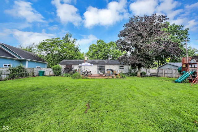 12606 Markay Dr, Fishers, IN 46038 - fenced backyard featuring a playground and a wooden deck