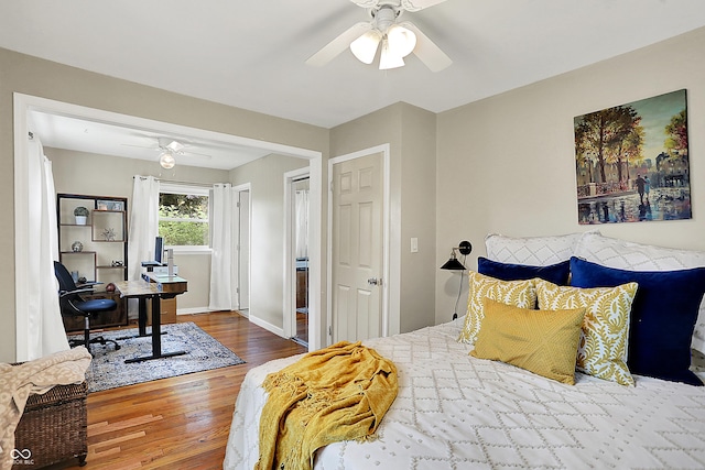 12606 Markay Dr, Fishers, IN 46038 - bedroom featuring wood finished floors, a desk, and a ceiling fan