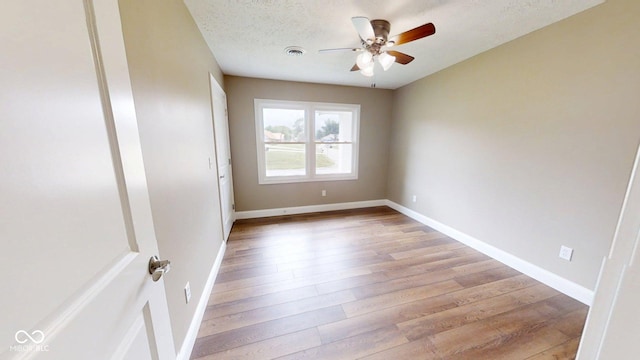 15 Morton Way, Batesville, IN 47006 - empty room with a ceiling fan and light wood-style floors