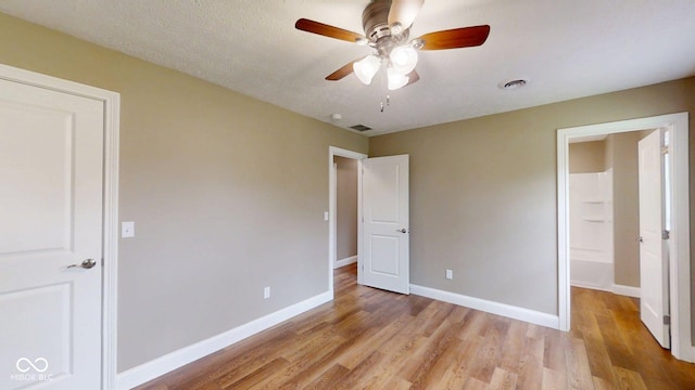 15 Morton Way, Batesville, IN 47006 - unfurnished bedroom featuring light wood-style floors and ceiling fan