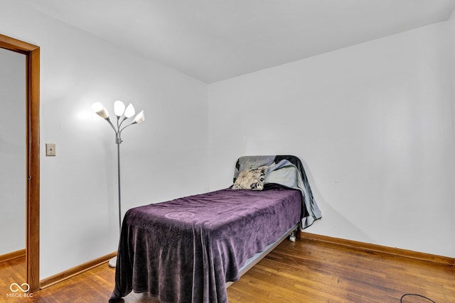10965 W Base Line Rd, Jamestown, IN 46147 - bedroom featuring wood finished floors and baseboards