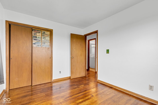 10965 W Base Line Rd, Jamestown, IN 46147 - unfurnished bedroom featuring wood finished floors and a closet