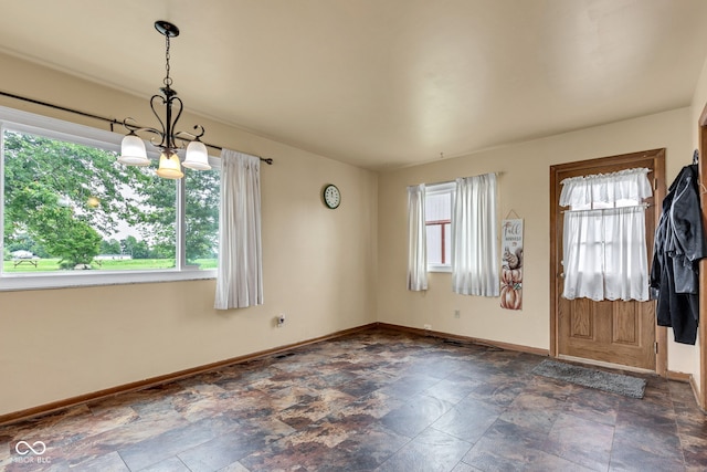 10965 W Base Line Rd, Jamestown, IN 46147 - entrance foyer featuring stone finish flooring and a chandelier