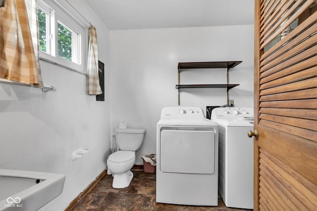 10965 W Base Line Rd, Jamestown, IN 46147 - laundry room featuring washing machine and clothes dryer and stone finish flooring