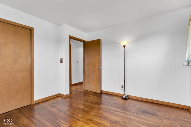 10965 W Base Line Rd, Jamestown, IN 46147 - empty room with wood finished floors and baseboards