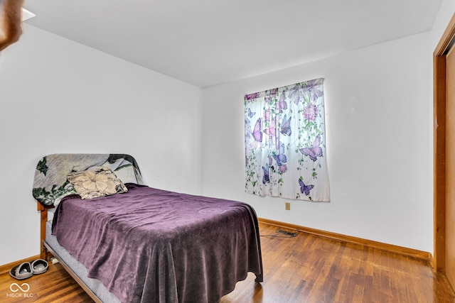 10965 W Base Line Rd, Jamestown, IN 46147 - bedroom with wood finished floors and baseboards