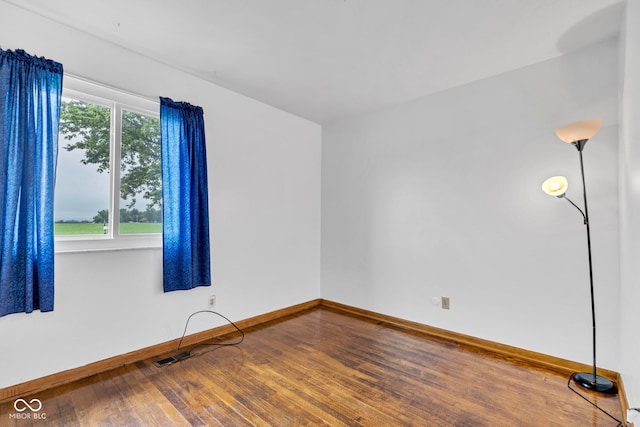 10965 W Base Line Rd, Jamestown, IN 46147 - spare room with hardwood / wood-style flooring and baseboards
