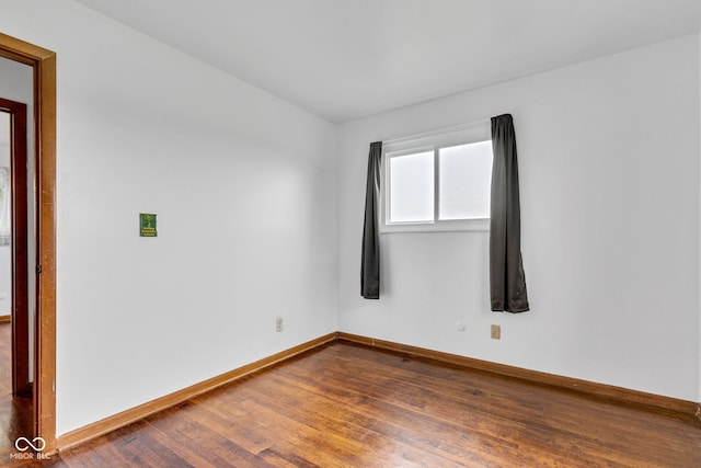 10965 W Base Line Rd, Jamestown, IN 46147 - spare room with dark wood-style floors and baseboards