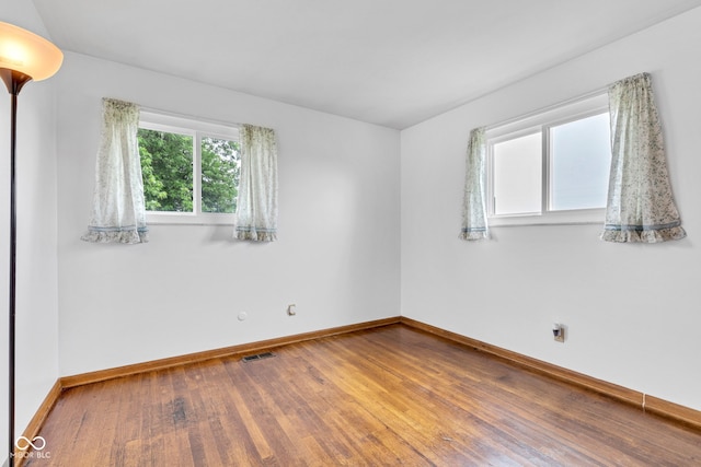 10965 W Base Line Rd, Jamestown, IN 46147 - empty room with wood finished floors and baseboards