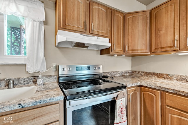 10965 W Base Line Rd, Jamestown, IN 46147 - kitchen featuring electric range and under cabinet range hood