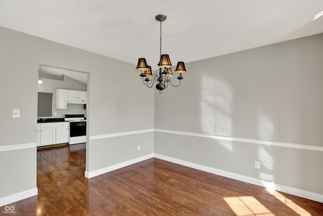 9055 Glass Chimney Ln, Fishers, IN 46037 - spare room with dark wood-style flooring and a chandelier