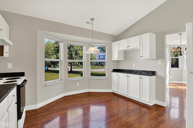 9055 Glass Chimney Ln, Fishers, IN 46037 - kitchen with range with electric stovetop, dark wood-style floors, pendant lighting, white cabinetry, and vaulted ceiling