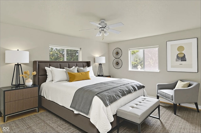 9055 Glass Chimney Ln, Fishers, IN 46037 - bedroom featuring wood finished floors and ceiling fan