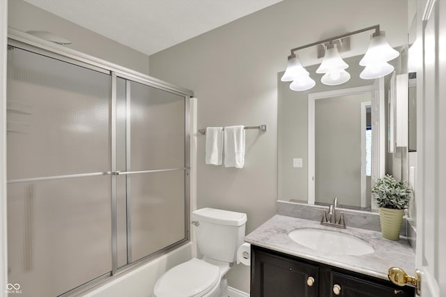 9055 Glass Chimney Ln, Fishers, IN 46037 - bathroom featuring vanity, enclosed tub / shower combo, and a chandelier