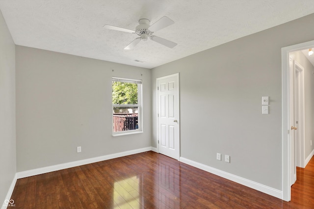 9055 Glass Chimney Ln, Fishers, IN 46037 - unfurnished room with wood-type flooring, ceiling fan, and a textured ceiling