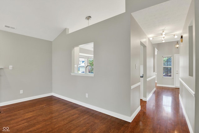 9055 Glass Chimney Ln, Fishers, IN 46037 - spare room with healthy amount of natural light, hardwood / wood-style flooring, lofted ceiling, and ceiling fan