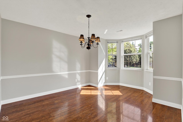 9055 Glass Chimney Ln, Fishers, IN 46037 - unfurnished dining area featuring a chandelier and hardwood / wood-style flooring