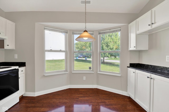 9055 Glass Chimney Ln, Fishers, IN 46037 - kitchen featuring electric range, dark wood-type flooring, white cabinets, and hanging light fixtures
