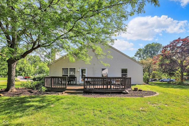 9055 Glass Chimney Ln, Fishers, IN 46037 - back of property with a lawn, a wooden deck, and a chimney