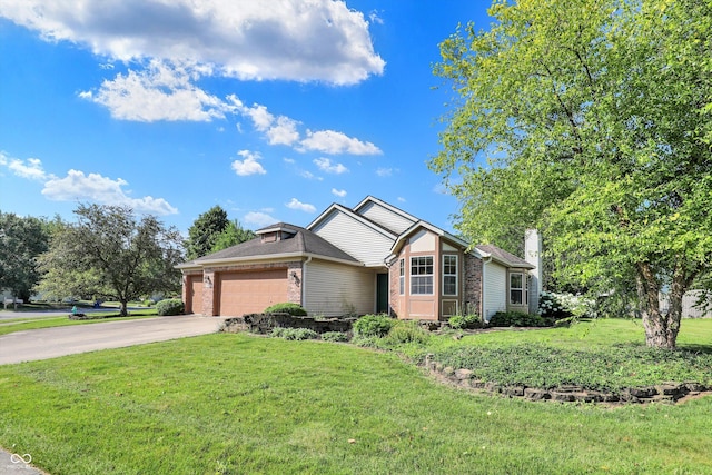 9055 Glass Chimney Ln, Fishers, IN 46037 - view of front of property with an attached garage, driveway, a front yard, and brick siding