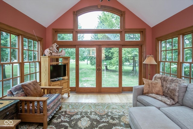 5538 N 700 W, Mccordsville, IN 46055 - living area featuring vaulted ceiling, wood finished floors, and french doors